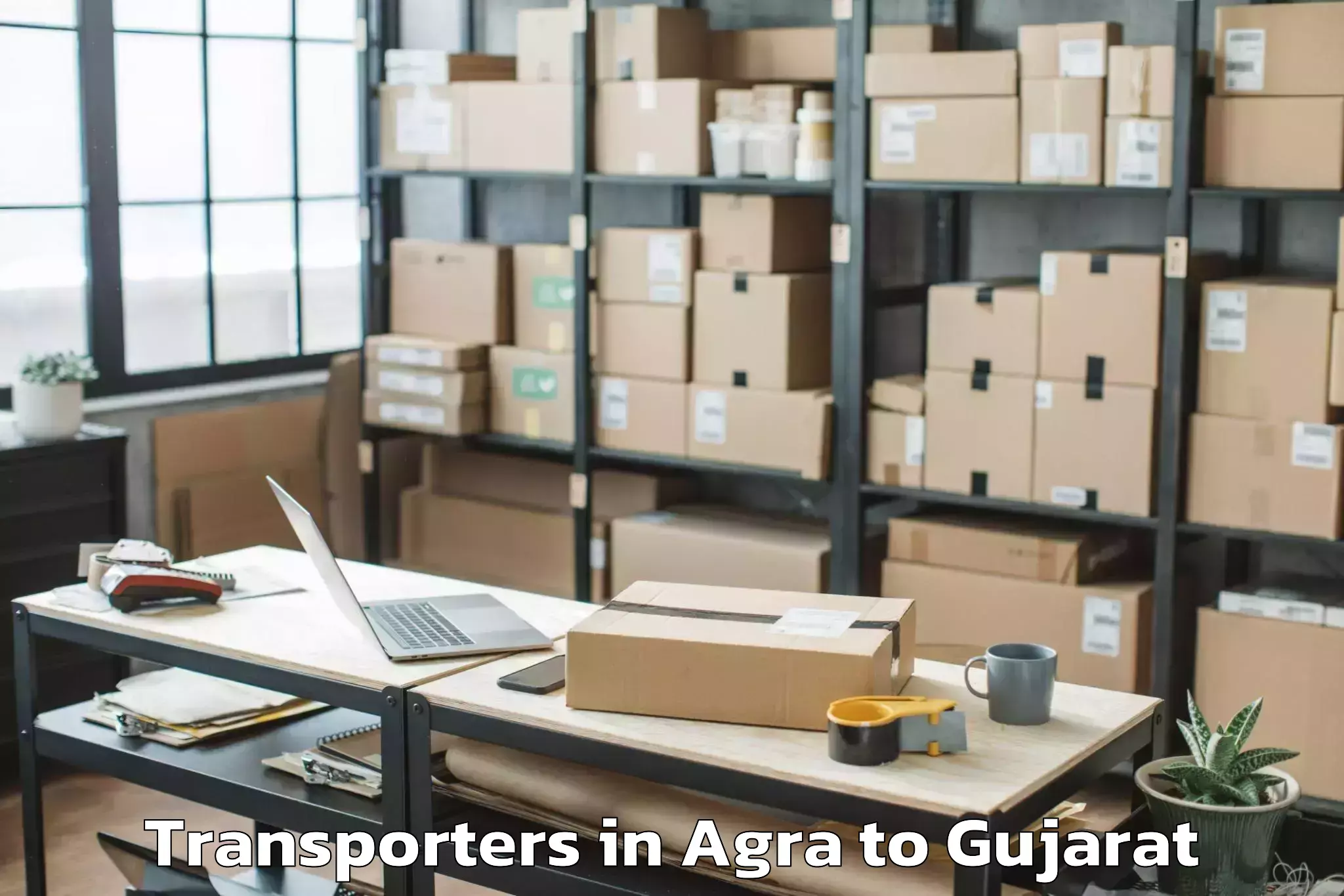 Top Agra to Bagasra Transporters Available